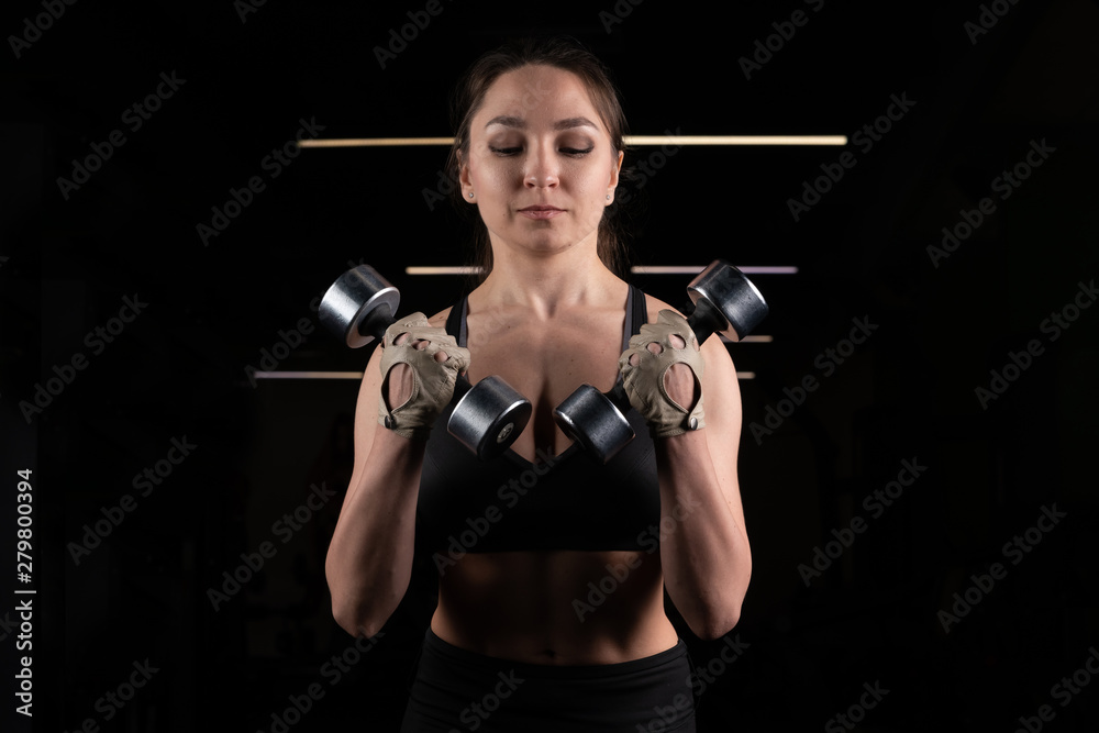 Pretty young sport woman is Workout in gym, Healthy lifestyle Pretty young sport woman is Workout in gym, Healthy lifestyle