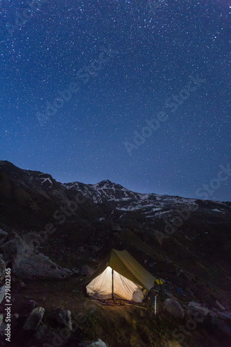Camping under stars - Himalayan Forest. Star gazing from Deo Tibba trek,Manali, Himachal pradesh, India. Beautiful landscape and snow scape in cold winter terrain. Astro photo,galaxy, stars. Outdoors