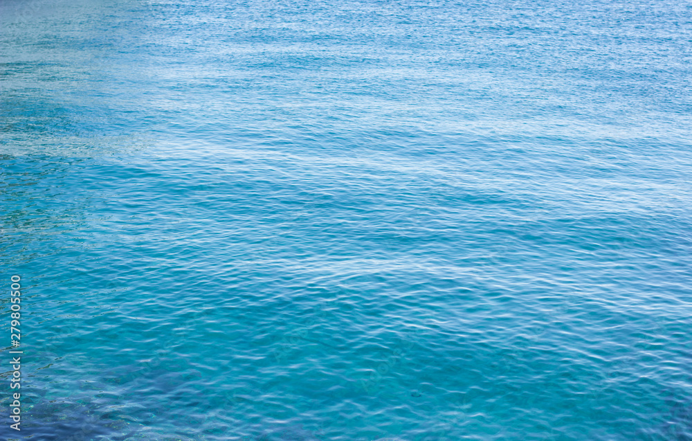 natural simple background of calm and peaceful blue water surface natural simple background of calm and peaceful blue water surface