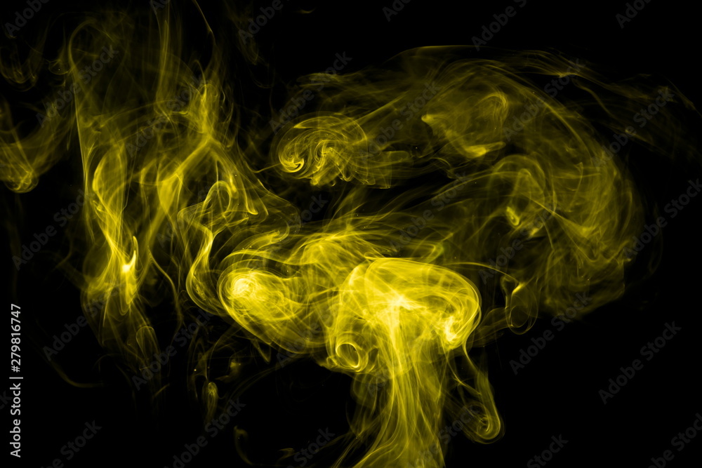 Yellow smoke on black background