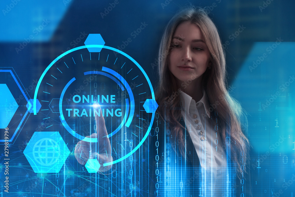 The concept of business, technology, the Internet and the network. A young entrepreneur working on a virtual screen of the future and sees the inscription: Online training The concept of business, technology, the Internet and the network. A young entrepreneur working on a virtual screen of the future and sees the inscription: Online training