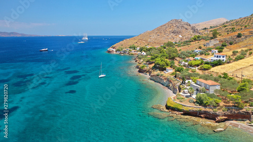 Aerial drone photo of small beach of Vlycho with clear turquoise sea in picturesque island of Ydra or Hydra, Saronic gulf, Greece
