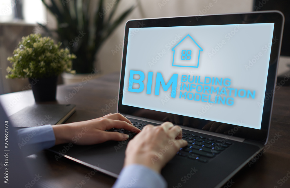 BIM - Building information modeling concept on screen. BIM - Building information modeling concept on screen.