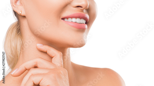 Close up photo of a woman smiling. Teeth health concept.