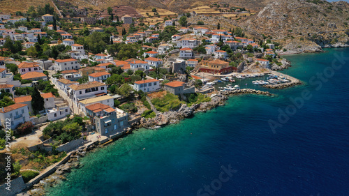Aerial drone photo of small picturesque seaside fishing village of Kamini in picturesque island of Ydra or Hydra, Saronic gulf, Greece