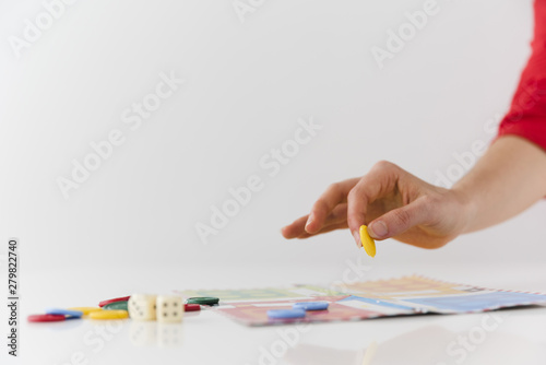 Close-up person playing board game