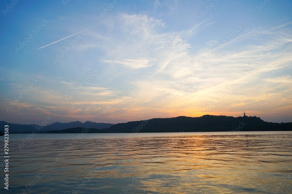 sunset over lake in xihu
