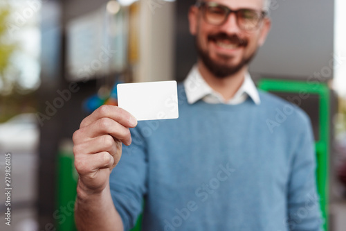 Happy client demonstrating blank card photo