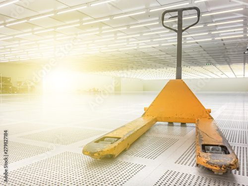 Old yellow hand lift or stacker in clean room 