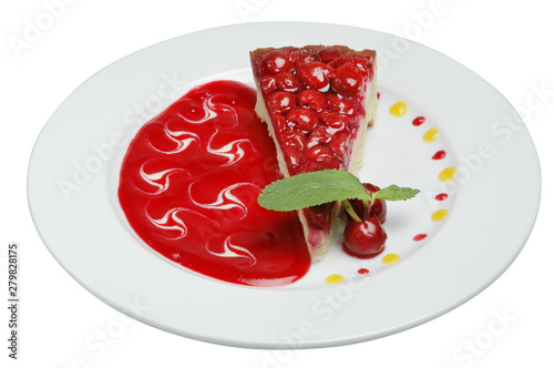 Closeup of a slice of cherry pie on a plate on a white background