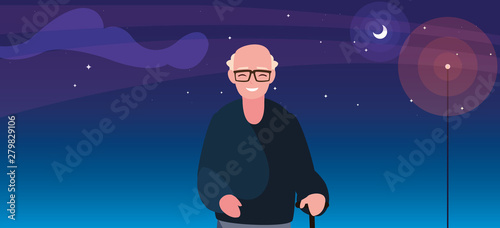 old man with walk stick at night
