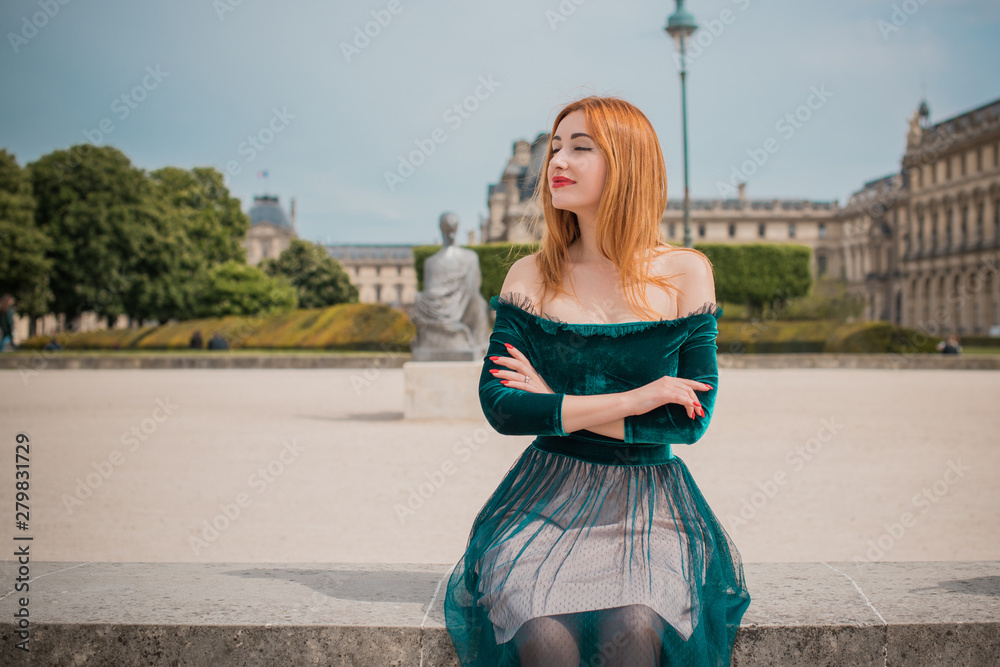 Holidays in Paris, France. Fashionable pretty woman rest in centre of city, concept of vacation. Lady in romantic look at street 