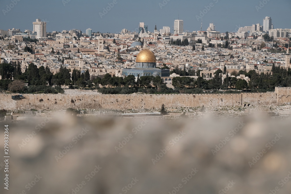 Jerusalem city with a dome of mosque with golden roof