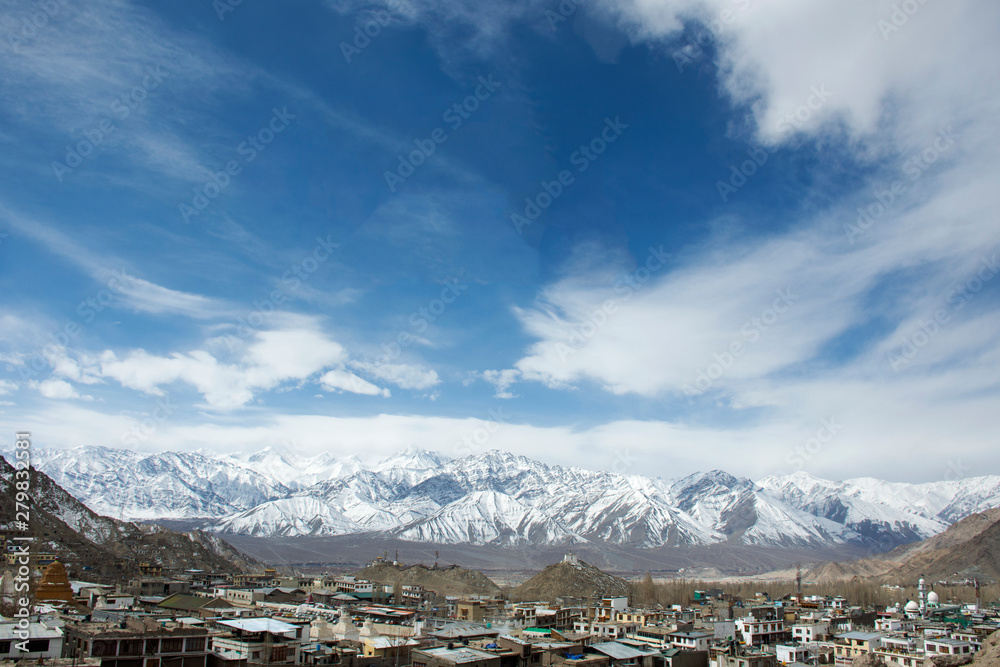 Aerial view landscape and cityscape of Leh Ladakh Village with Himalayas or Himalaya mountain from viewpoint of Leh Stok Palace Museum at Leh Ladakh in Jammu and Kashmir, India
