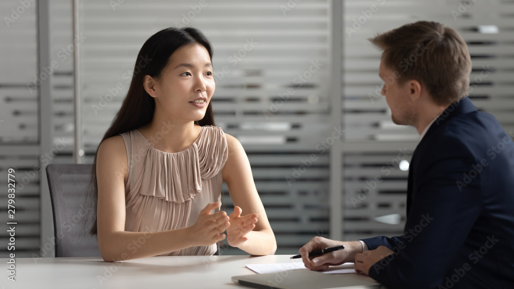 Confident asian applicant manager talk to hr employer consulting customer Confident asian applicant manager talk to hr employer consulting customer