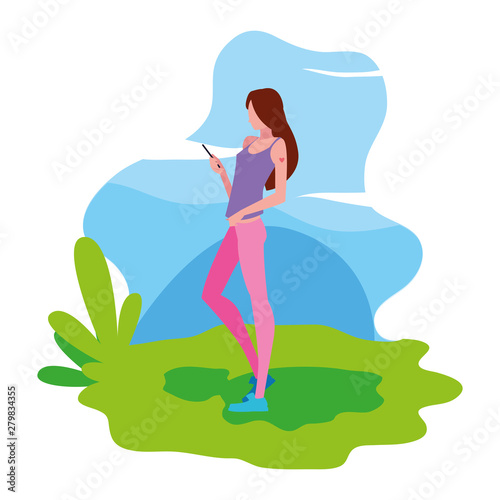 woman using smartphone device in the landscape