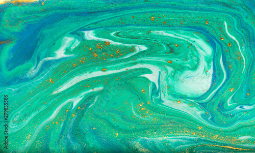 Blue, green and gold marbling pattern. Golden powder marble liquid texture.