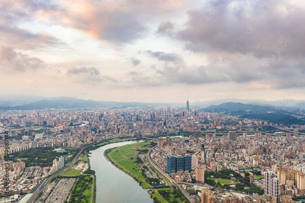 Asia business concept image, panoramic modern cityscape building bird’s eye view under sunrise and morning blue bright sky, shot in Taipei, Taiwan.