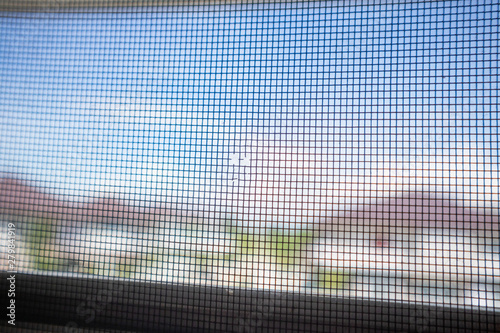 damaged mosquito net wire screen on house window protection against insect