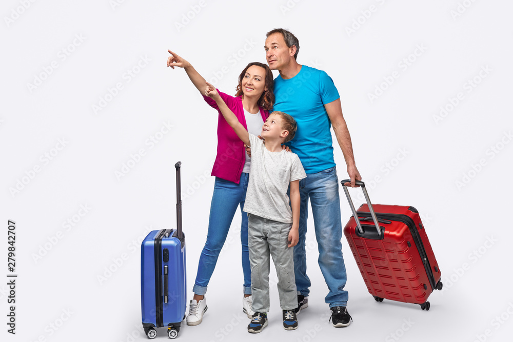 Family of travelers pointing away Family of travelers pointing away