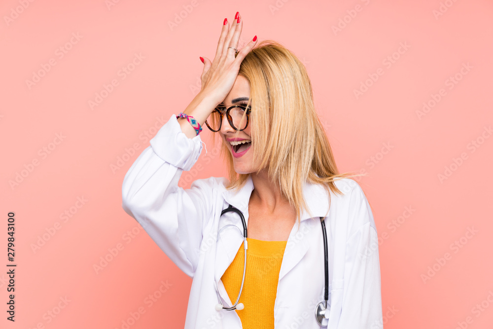 Young blonde doctor woman having doubts with confuse face expression Young blonde doctor woman having doubts with confuse face expression
