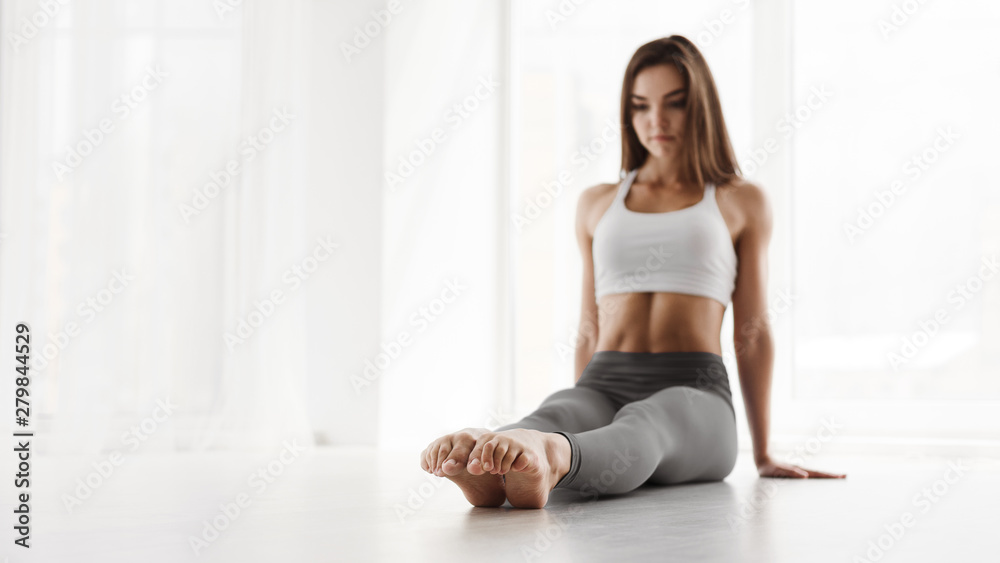 Contemp Dancer Pointing Toes In Sitting Position. Copy Space Contemp Dancer Pointing Toes In Sitting Position. Copy Space
