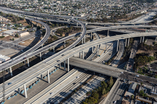 Aerial view of the Harbor 110 and 105 freeway interchange roads and bridges south of downtown Los Angeles in Southern California.