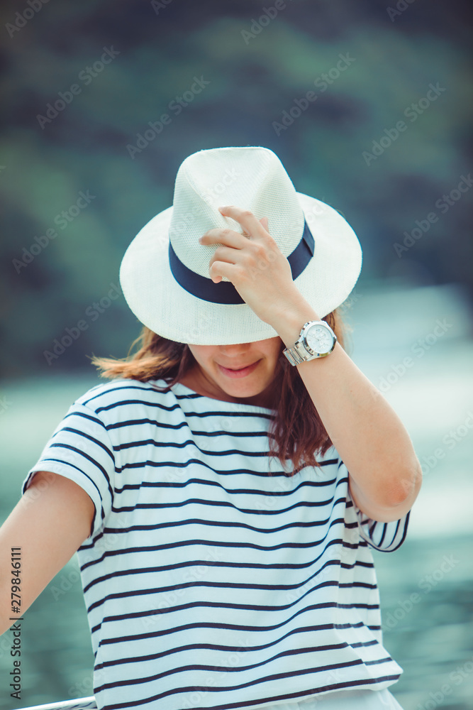 woman portrait in white fedora hat