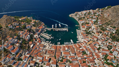 Aerial drone photo of picturesque port and main village of Hydra or Ydra island with beautiful neoclassic houses, Saronic gulf, Greece photo