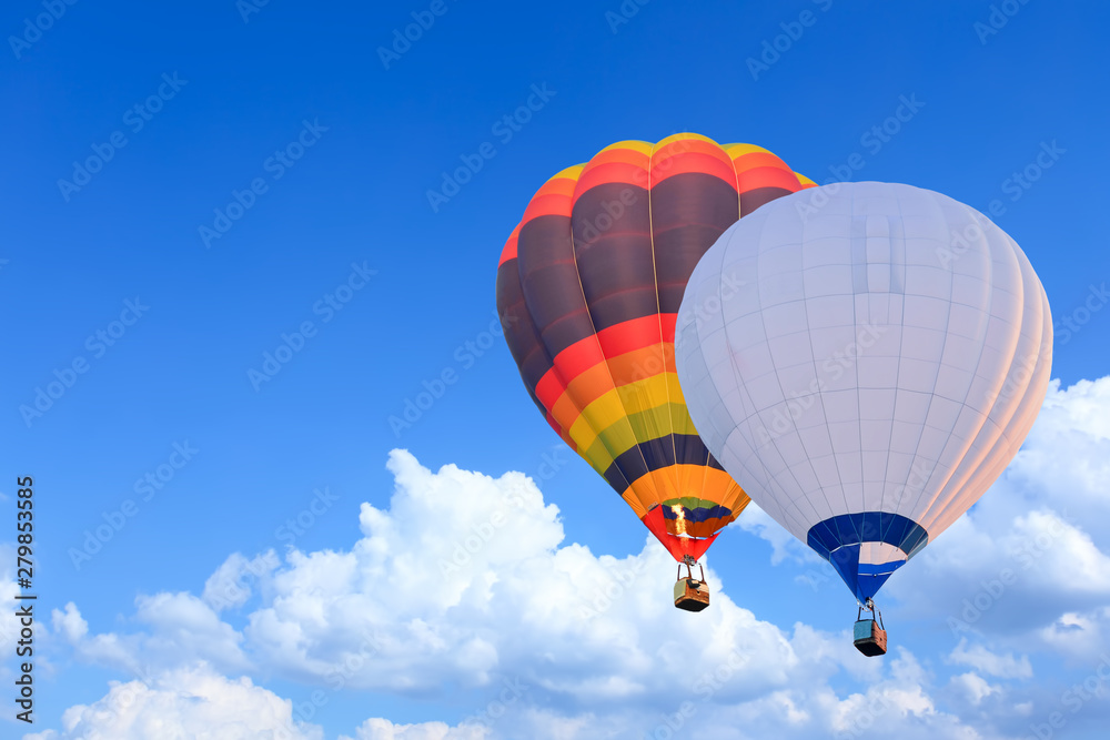 Naklejka premium Colorful Hot Air Balloons in Flight over blue sky