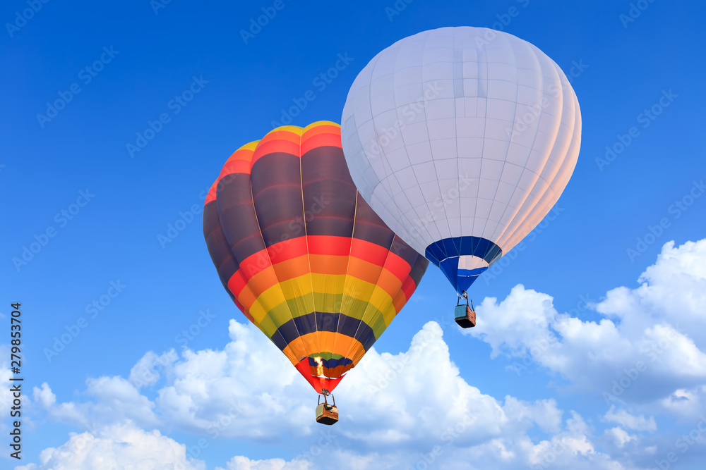 Fototapeta premium Colorful Hot Air Balloons in Flight over blue sky