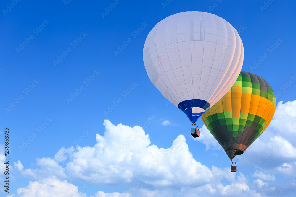 Naklejka premium Colorful Hot Air Balloons in Flight over blue sky
