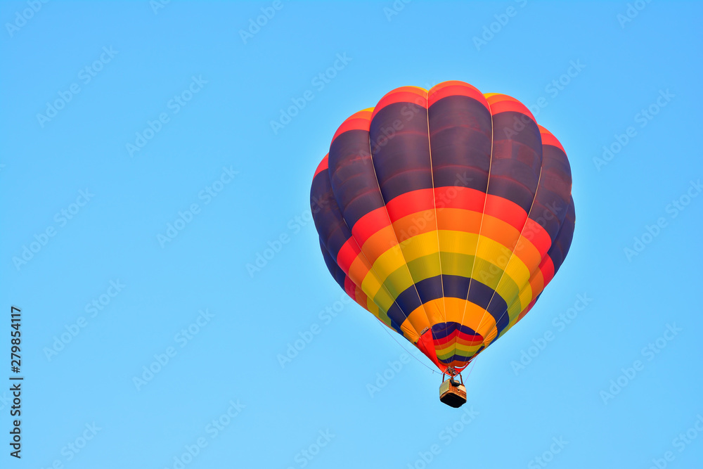Fototapeta premium Colorful Hot Air Balloons in Flight over blue sky