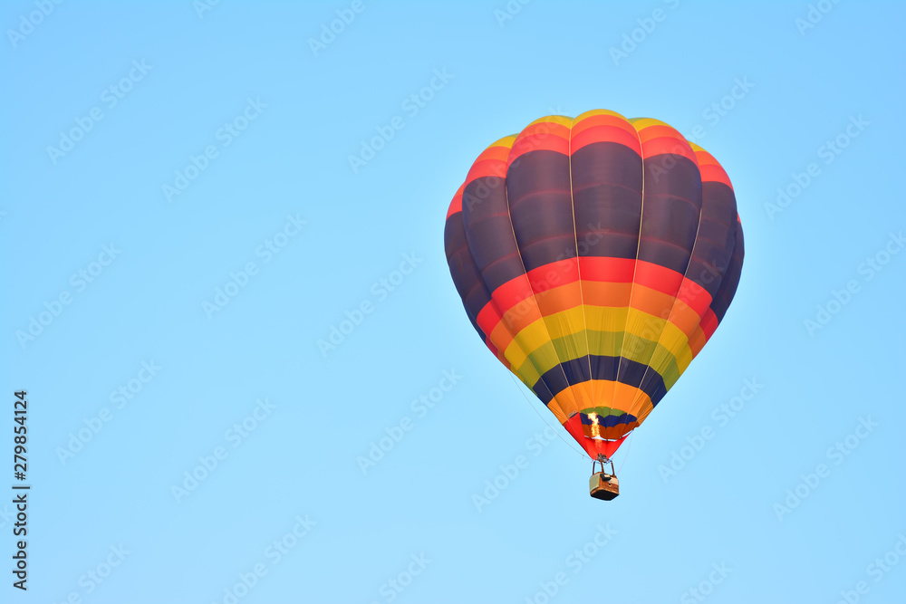 Fototapeta premium Colorful Hot Air Balloons in Flight over blue sky