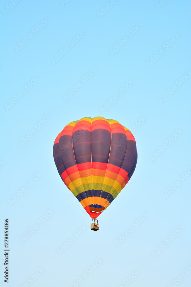 Fototapeta premium Colorful Hot Air Balloons in Flight over blue sky