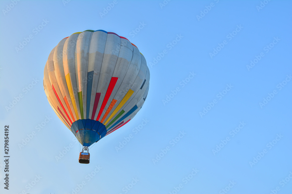 Fototapeta premium Colorful Hot Air Balloons in Flight over blue sky