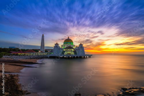 Sunset moments at Malacca Straits Mosque ( Masjid Selat Melaka), It is a mosque located on the man-made Malacca Island near Malacca Town, Malaysia © shahrilkhmd