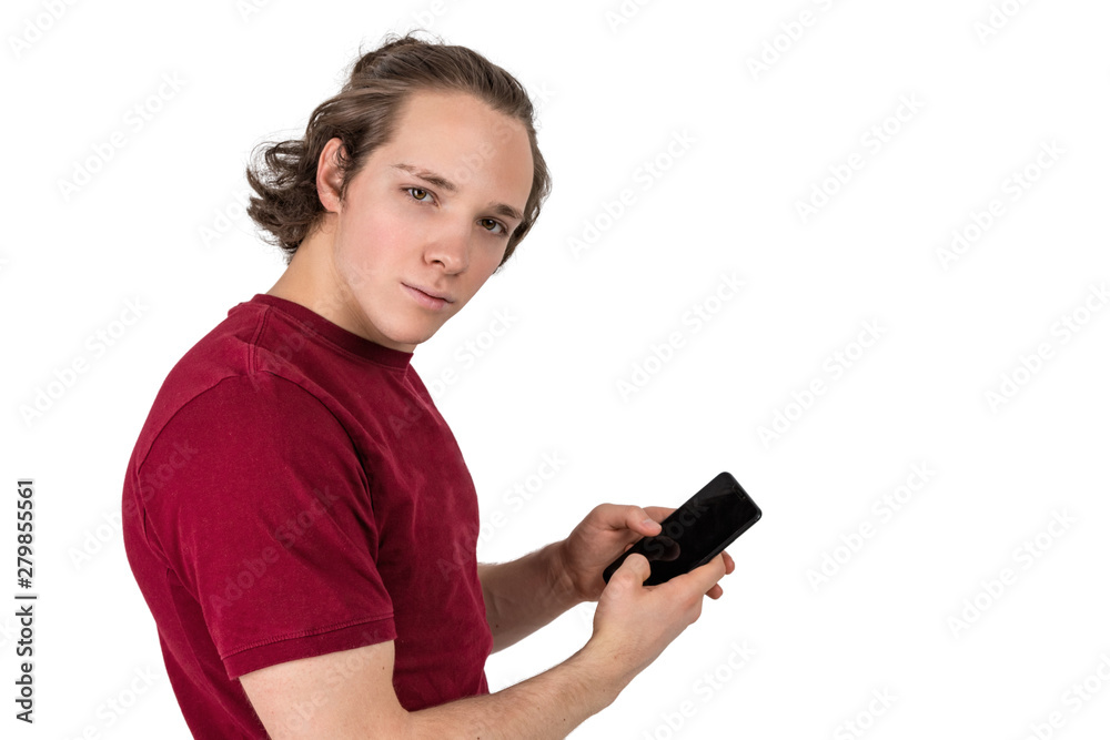 Handsome young man in t-shirt holding blank screen smartphone over white background Handsome young man in t-shirt holding blank screen smartphone over white background