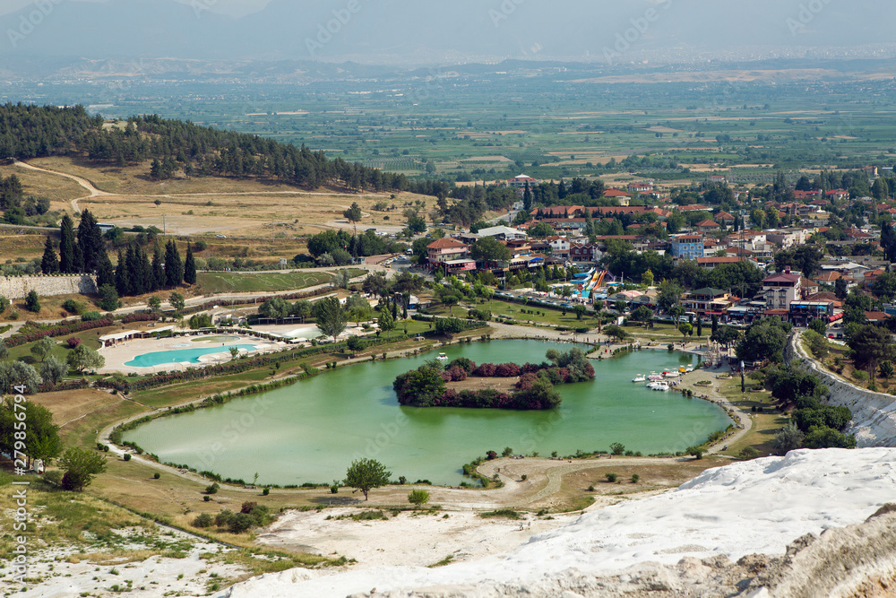 white calcium mountain with granite with small waterfall in summer in Pamukkale