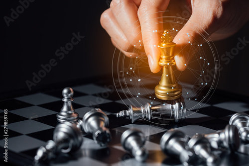 Business futuristic graphic icon,silver and golden chess board game.strategy ideas and connection concept in vintage color tone. photo