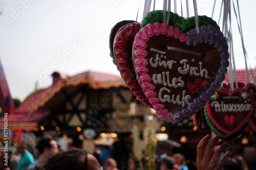 gingerbread heart on a oktoberfest or amusement park or state fair © beats_