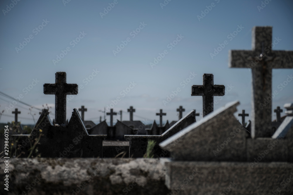 crosses in the tombs of a cemetery