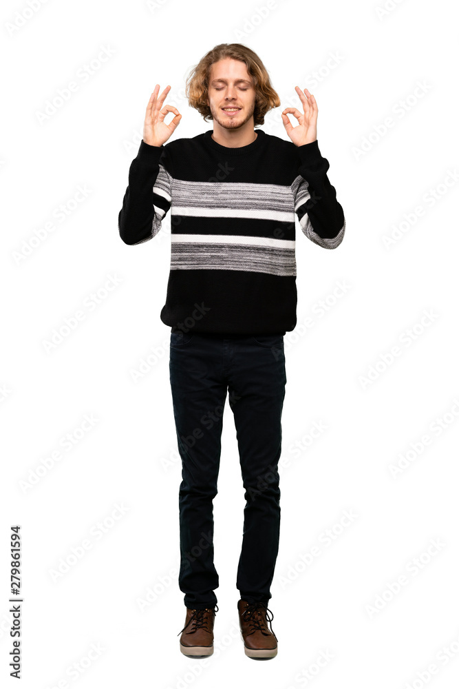 Full-length shot of Blonde man in zen pose over isolated white background Full-length shot of Blonde man in zen pose over isolated white background