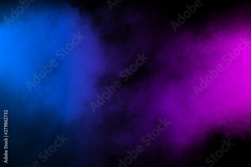 Fototapeta Naklejka Na Ścianę i Meble -  Pink blue powder explosion on black background.Pink blue dust splash cloud on dark background.