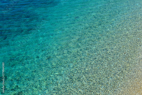 Turquonise water on Kape beach near Athens, Aegean sea, Greece. 