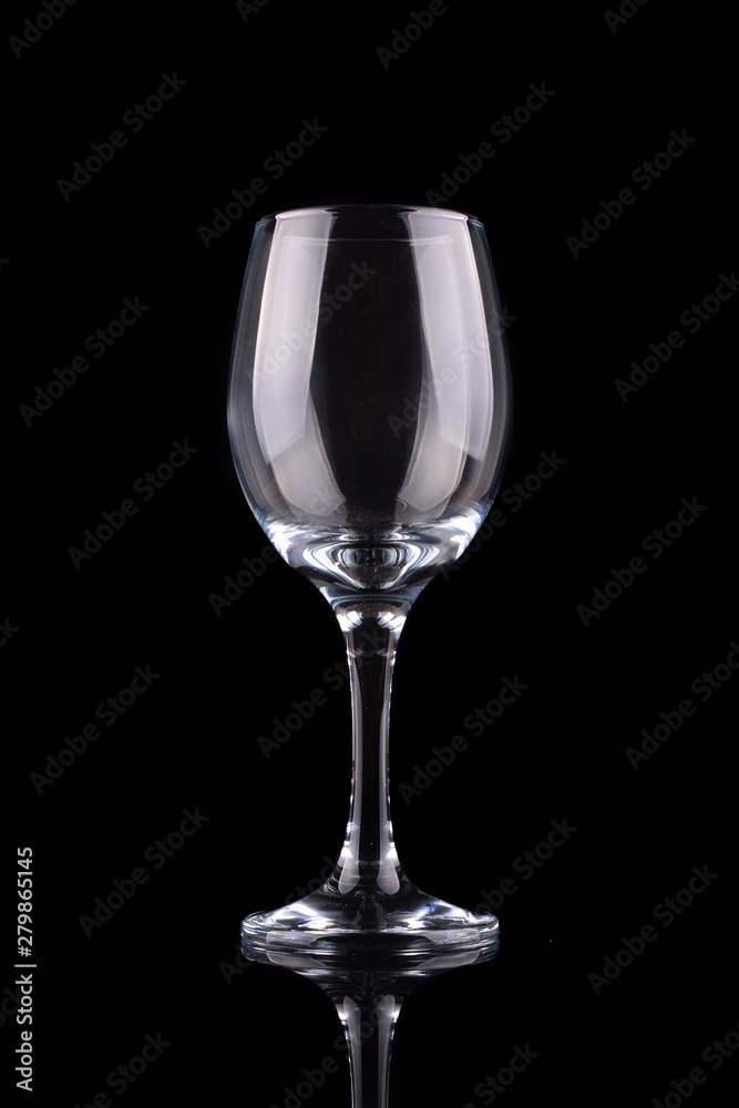 Empty wine glass isolated on black