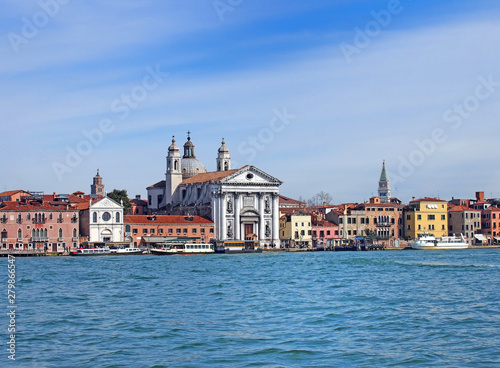 a view of venice from the sea showing the zattere salute area with the church of santa maria del rosario and waterfront landmark buildings