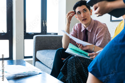 Businessman listening to his colleague