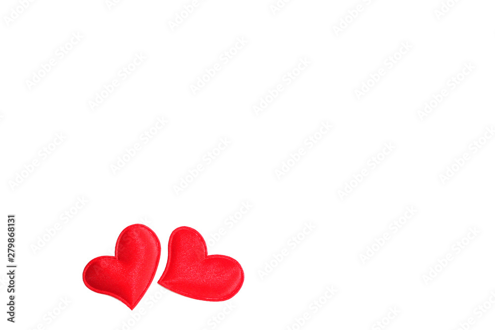 red hearts sewn from fabric, on a white background, festive mood, top view, copy space, love