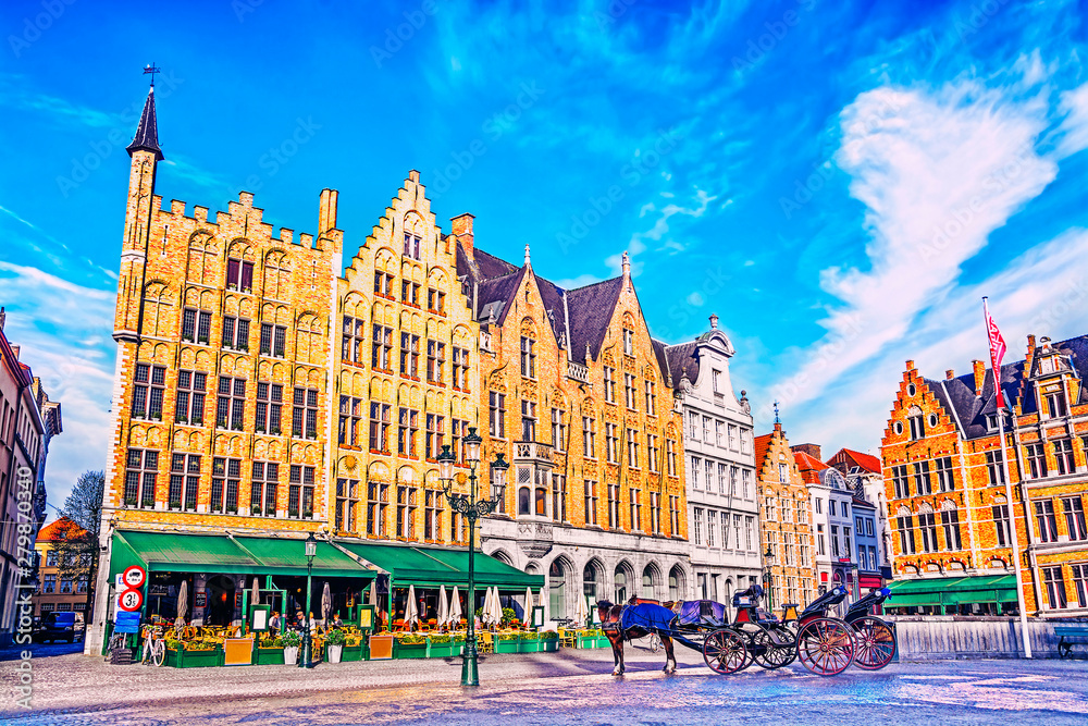 Fototapeta premium Colorful old brick house on the Grote Markt square in the medieval town of Bruges, Belgium